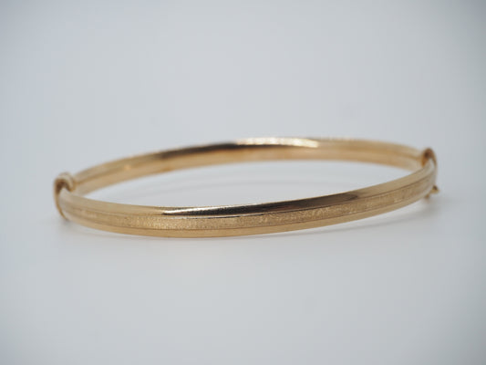 Bracciale a manetta dorato