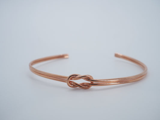 Bracciale semirigido legame nodo rosa